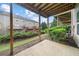 A ground-level patio with view of the green space and neighboring decks at 10775 Brunson Dr, Johns Creek, GA 30097