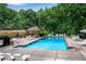 Community pool with ample seating and shaded area perfect for summertime activities at 1209 Colony Cir, Marietta, GA 30068