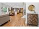 Bright open-concept living space with hardwood floors leading to a modern kitchen at 81 Walthall Se St, Atlanta, GA 30316