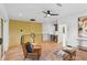 Spacious living area with hardwood floors, wet bar, modern lighting and comfortable seating at 81 Walthall Se St, Atlanta, GA 30316