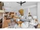 Open-concept living room with hardwood floors, fireplace, and modern furnishings at 81 Walthall Se St, Atlanta, GA 30316