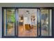 Open floor plan showcasing wet bar, living room and outdoor patio through sliding glass doors at 81 Walthall Se St, Atlanta, GA 30316