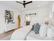 Relaxing main bedroom with modern decor, a ceiling fan, and ample natural light at 81 Walthall Se St, Atlanta, GA 30316