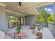 An open air patio features a dining table and an outdoor seating area at 81 Walthall Se St, Atlanta, GA 30316