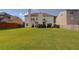 Large, well-maintained backyard offering plenty of space for recreation and entertaining guests at 110 Ashbury Circle Cir, Dallas, GA 30157