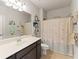 Bathroom with vanity, mirror and a shower with nautical themed shower curtain at 110 Ashbury Circle Cir, Dallas, GA 30157