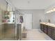 Bathroom featuring a glass enclosed shower, soaking tub, double vanity and tile floors at 110 Ashbury Circle Cir, Dallas, GA 30157