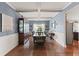 Elegant dining room with hardwood floors, coffered ceiling, and stylish furnishings for entertaining at 110 Ashbury Circle Cir, Dallas, GA 30157
