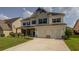 Charming two-story home with a manicured lawn, a two car garage, and a inviting front porch at 110 Ashbury Circle Cir, Dallas, GA 30157