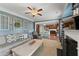 Open-concept living room flows into the kitchen with hardwood floors and recessed lighting at 110 Ashbury Circle Cir, Dallas, GA 30157