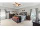 Spacious main bedroom with trey ceilings, neutral paint, large windows and carpeted floors at 110 Ashbury Circle Cir, Dallas, GA 30157