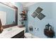 Cozy powder room with a stylish vanity and decorative wall accents at 110 Ashbury Circle Cir, Dallas, GA 30157