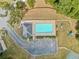 Aerial view of a community pool and playground providing fun Gathering amenities at 11833 Spring Lake Way, Fayetteville, GA 30215