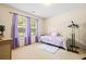 Cozy bedroom with carpet, natural light, and ample space for storage at 11833 Spring Lake Way, Fayetteville, GA 30215