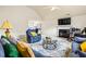 Bright living room with vaulted ceiling, plush sofas, and a cozy fireplace at 11833 Spring Lake Way, Fayetteville, GA 30215