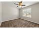 Bedroom with a ceiling fan and natural light from one window at 2479 Heatherton Ct, Dacula, GA 30019