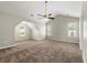 Spacious primary bedroom with vaulted ceilings and two windows at 2479 Heatherton Ct, Dacula, GA 30019