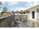 Enjoy outdoor relaxation on this back deck with comfortable seating and a view of the backyard at 456 Pretty View Se Ln, Smyrna, GA 30082