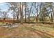 Large private backyard featuring a dedicated firepit area with comfortable seating, perfect for entertaining at 456 Pretty View Se Ln, Smyrna, GA 30082
