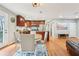 Open kitchen with stainless appliances, island, and eat-in dining space at 456 Pretty View Se Ln, Smyrna, GA 30082