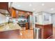 Well-equipped kitchen featuring stainless steel appliances and granite countertops at 456 Pretty View Se Ln, Smyrna, GA 30082