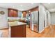 Updated kitchen with stainless steel appliances and granite countertops at 456 Pretty View Se Ln, Smyrna, GA 30082