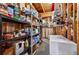 Spacious basement storage with shelves and a chest freezer at 6490 Ivey Hill Dr, Cumming, GA 30040