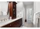 Bathroom features double sink vanity, custom cabinet, and walk-in shower at 6490 Ivey Hill Dr, Cumming, GA 30040