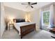 Bright bedroom with natural light and a large bed with side tables at 6490 Ivey Hill Dr, Cumming, GA 30040