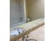 Bathroom with double sinks and shower and bath combination at 6851 Roswell Rd # 15, Atlanta, GA 30328