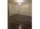 Dining area with new flooring, chair rail, and a chandelier at 6851 Roswell Rd # 15, Atlanta, GA 30328