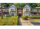 Attractive two-story home with black trimmed windows and an inviting landscaped front yard at 6851 Roswell Rd # 15, Atlanta, GA 30328