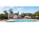 Enjoy the sparkling community pool and clubhouse nestled in a park-like setting with lounge chairs at 6851 Roswell Rd # 15, Atlanta, GA 30328
