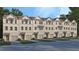 Modern townhome exterior with a neutral color scheme and attached garages at 1336 Lakota Pl, Atlanta, GA 30315