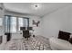 Home office with a desk and modern decor at 1542 Villageside Ct, Lawrenceville, GA 30043