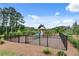 Well-maintained community playground featuring swings and slides for outdoor fun at 1542 Villageside Ct, Lawrenceville, GA 30043