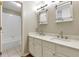 Elegant bathroom with double sinks, marble countertops, and a tub with tile surround at 5741 Stonekirk Walk Northwest, Acworth, GA 30101