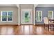 Bright foyer with hardwood floors, featuring a front door with sidelights and views to the front yard at 5741 Stonekirk Walk Northwest, Acworth, GA 30101