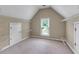 Large walk-in closet with ample shelving and natural light from the window at 5741 Stonekirk Walk Northwest, Acworth, GA 30101