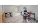 Bedroom features gray wood-look flooring, a trundle bed, and a workstation at 834 Lake Hollow Sw Blvd, Marietta, GA 30064