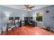 Spacious bedroom featuring a home office and workout area with hardwood floors and natural light at 834 Lake Hollow Sw Blvd, Marietta, GA 30064