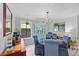Dining room with chandelier, modern furnishings, lots of light and live houseplants at 834 Lake Hollow Sw Blvd, Marietta, GA 30064