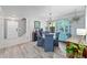 Elegant dining room showcasing a blue hutch, chandelier, and hardwood floors at 834 Lake Hollow Sw Blvd, Marietta, GA 30064
