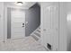 Bright entryway features tile floors, staircase access, and two door entry at 834 Lake Hollow Sw Blvd, Marietta, GA 30064