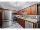 Updated kitchen features stainless steel appliances, stylish countertops, and lots of cabinet space at 834 Lake Hollow Sw Blvd, Marietta, GA 30064