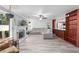 Large living room with fireplace, hardwood floors, and access to kitchen at 834 Lake Hollow Sw Blvd, Marietta, GA 30064