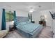 Luxurious main bedroom features a plush bed, stylish decor, and plenty of natural light at 834 Lake Hollow Sw Blvd, Marietta, GA 30064