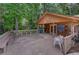 Large pool house deck with bench seating plus pool rules and storage add practical amenities to the community pool area at 834 Lake Hollow Sw Blvd, Marietta, GA 30064