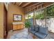 Cozy sunroom with comfortable seating, view of the backyard, and a relaxing atmosphere at 834 Lake Hollow Sw Blvd, Marietta, GA 30064