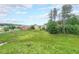 Expansive green backyard with mature trees, great location to build your custom dream home at 1057 Cotton Oak Dr, Lawrenceville, GA 30045